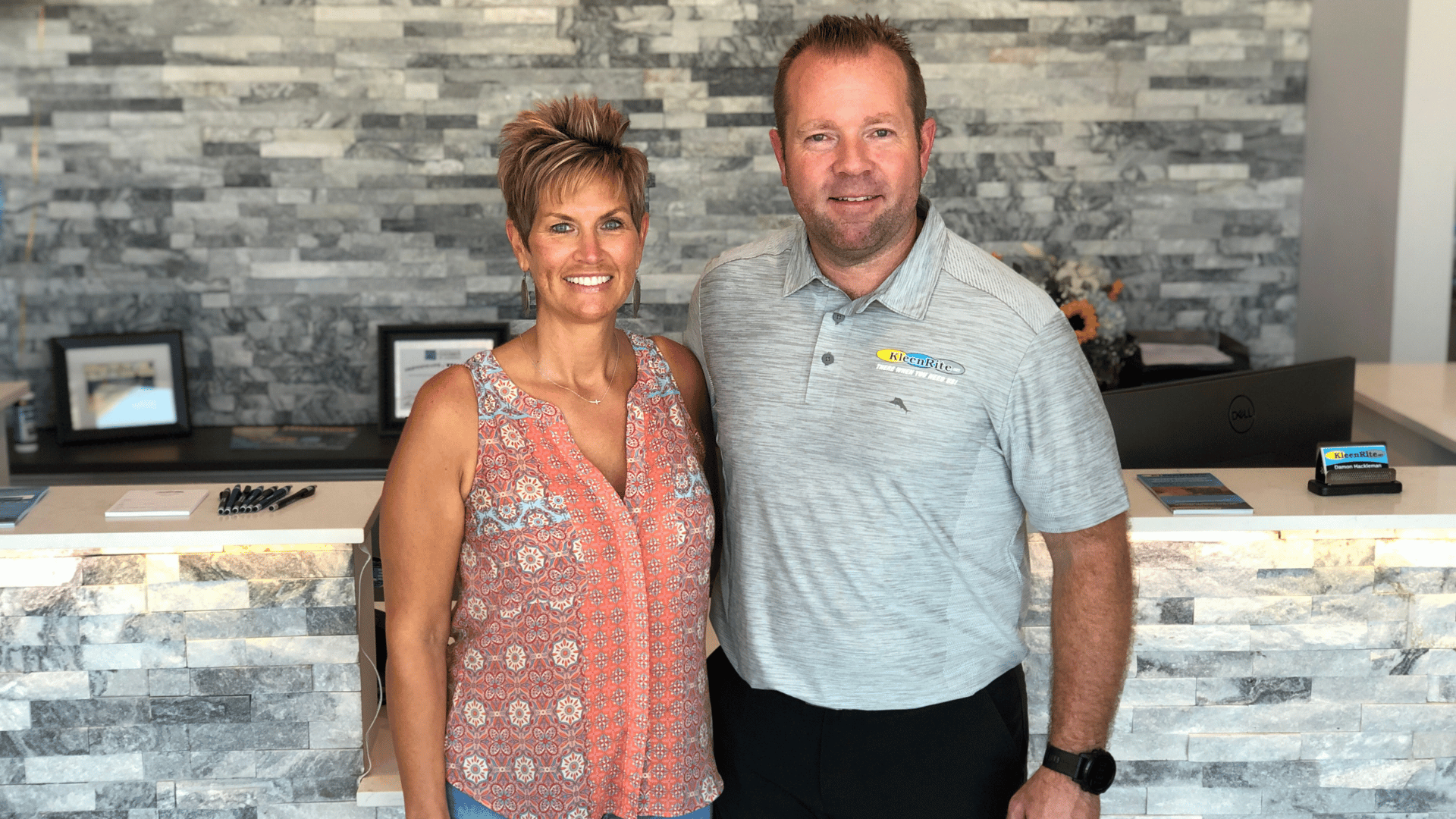 Damon and Darla and the ribbon cutting celebration of their new office, located on Country Fair Drive in Champaign.