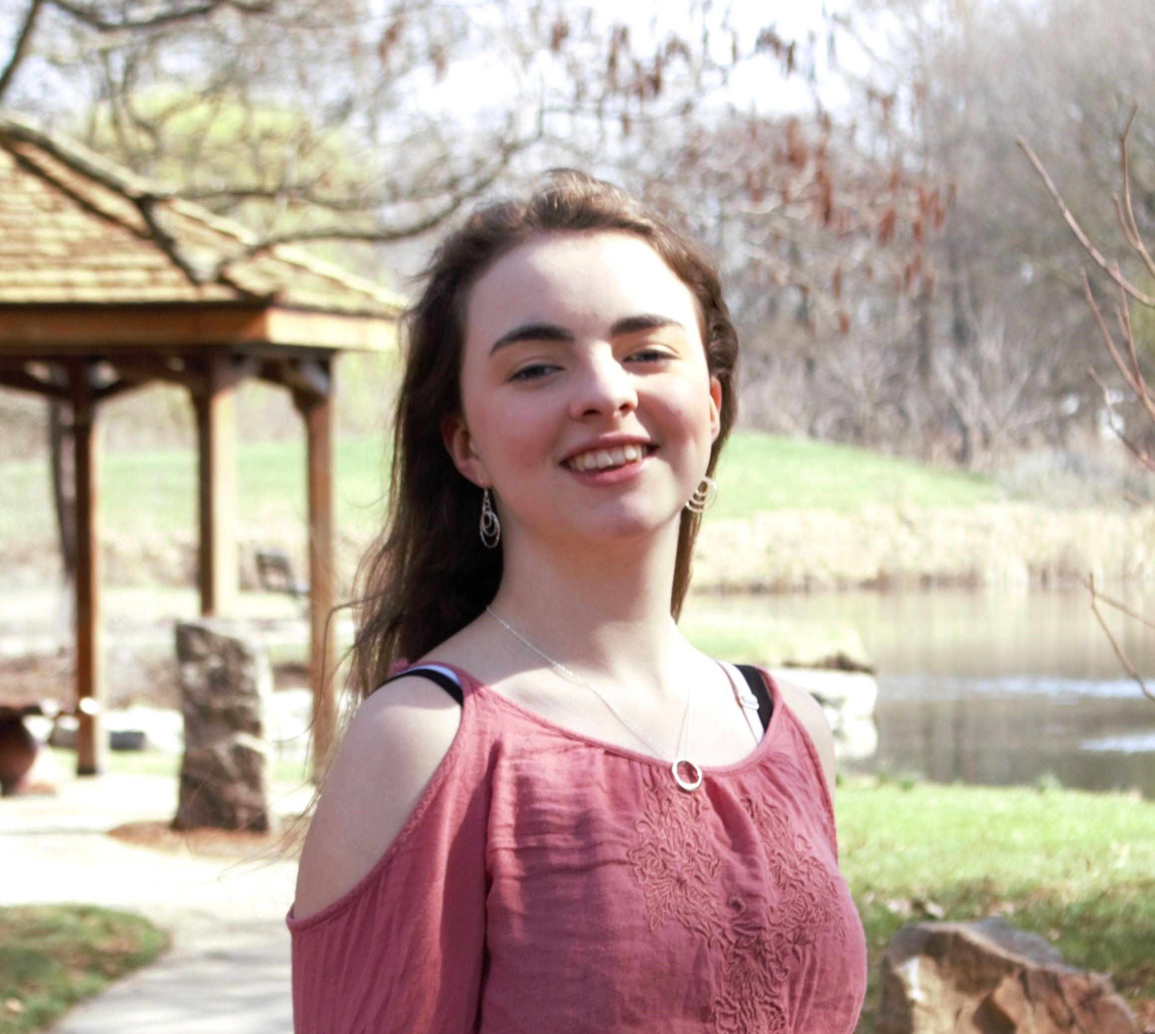 Final - Jpeg Copy Photo of Dee smiling at the camera